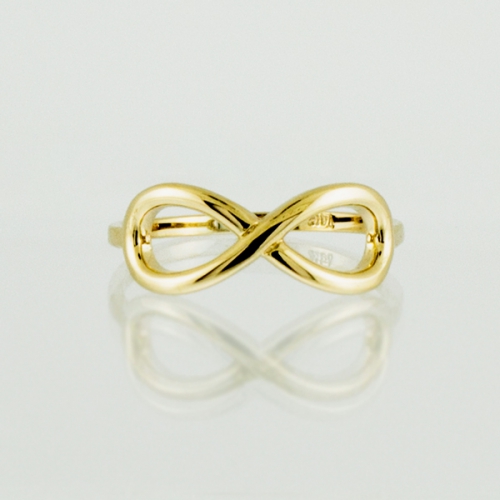 Серебряное кольцо "Бесконечность" с золотым покрытием